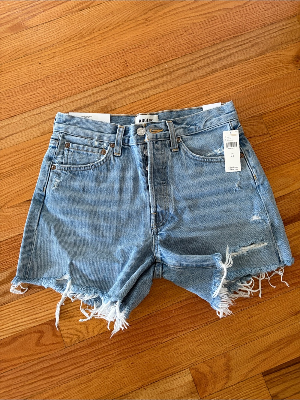 Agolde Light Wash Frayed Hem Denim Shorts